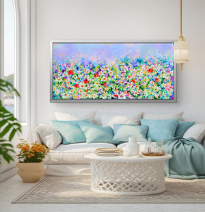 White Daisy and Red Poppy Field Floral Canvas Art displayed in a bright living room with cozy furniture and natural light.