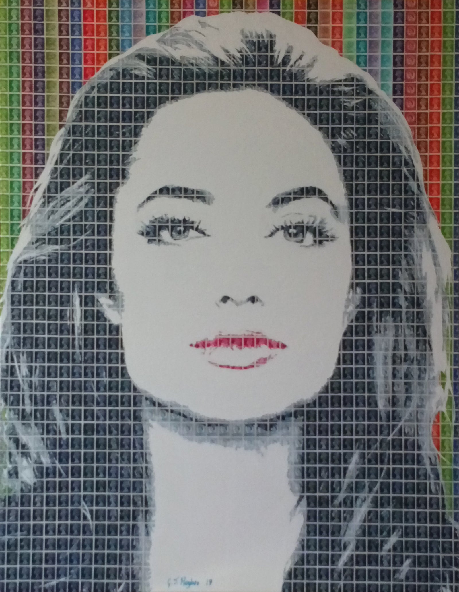 Mixed media stamp portrait of Angelina Jolie created with British postage stamps in a vibrant layered collage.