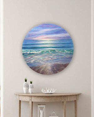 Circular seascape painting of waves and soft clouds in a serene coastal scene.